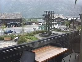 View to the village square from the first floor cafe in Lom